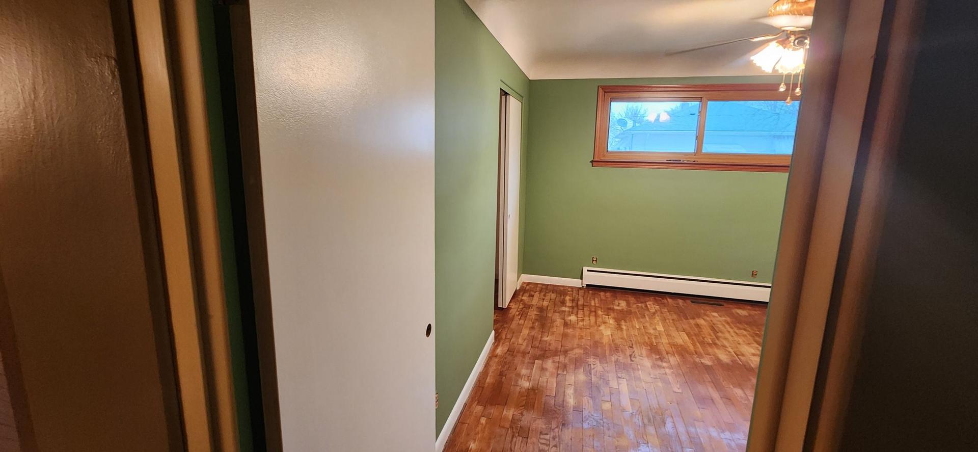 Freshly painted interior walls and trim in an Essexville, MI home