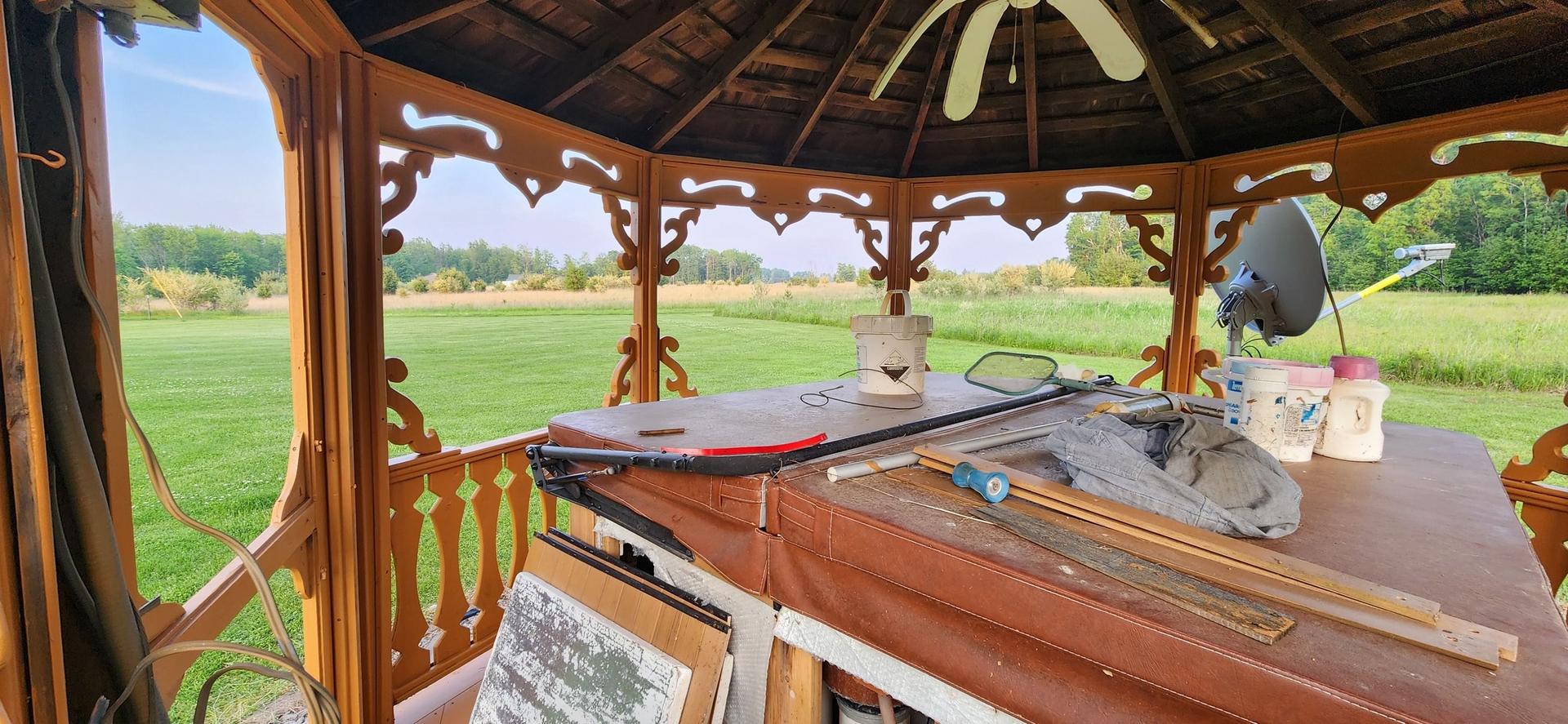 Freshly cleaned decks and gazebo after power washing in Prescott, MI