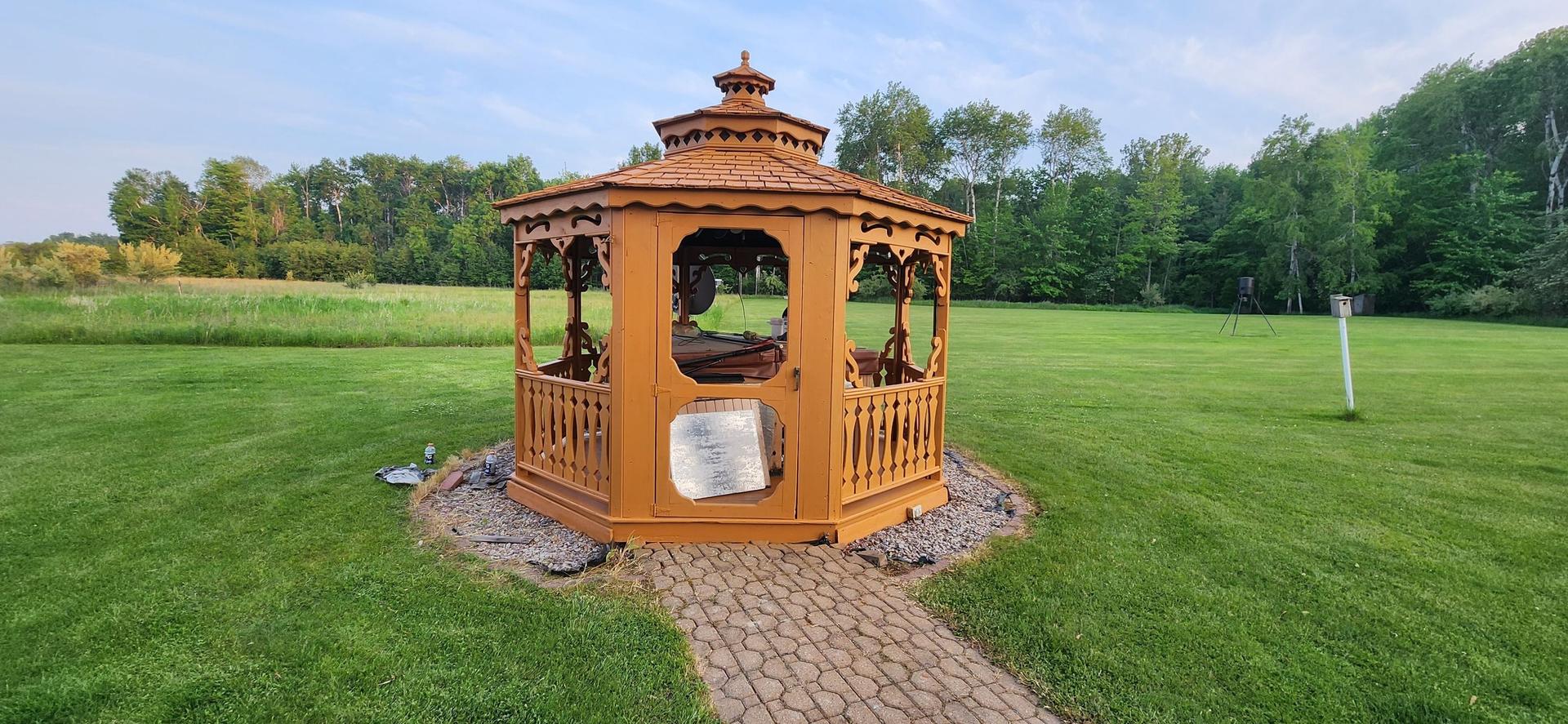 Freshly cleaned decks and gazebo after power washing in Prescott, MI