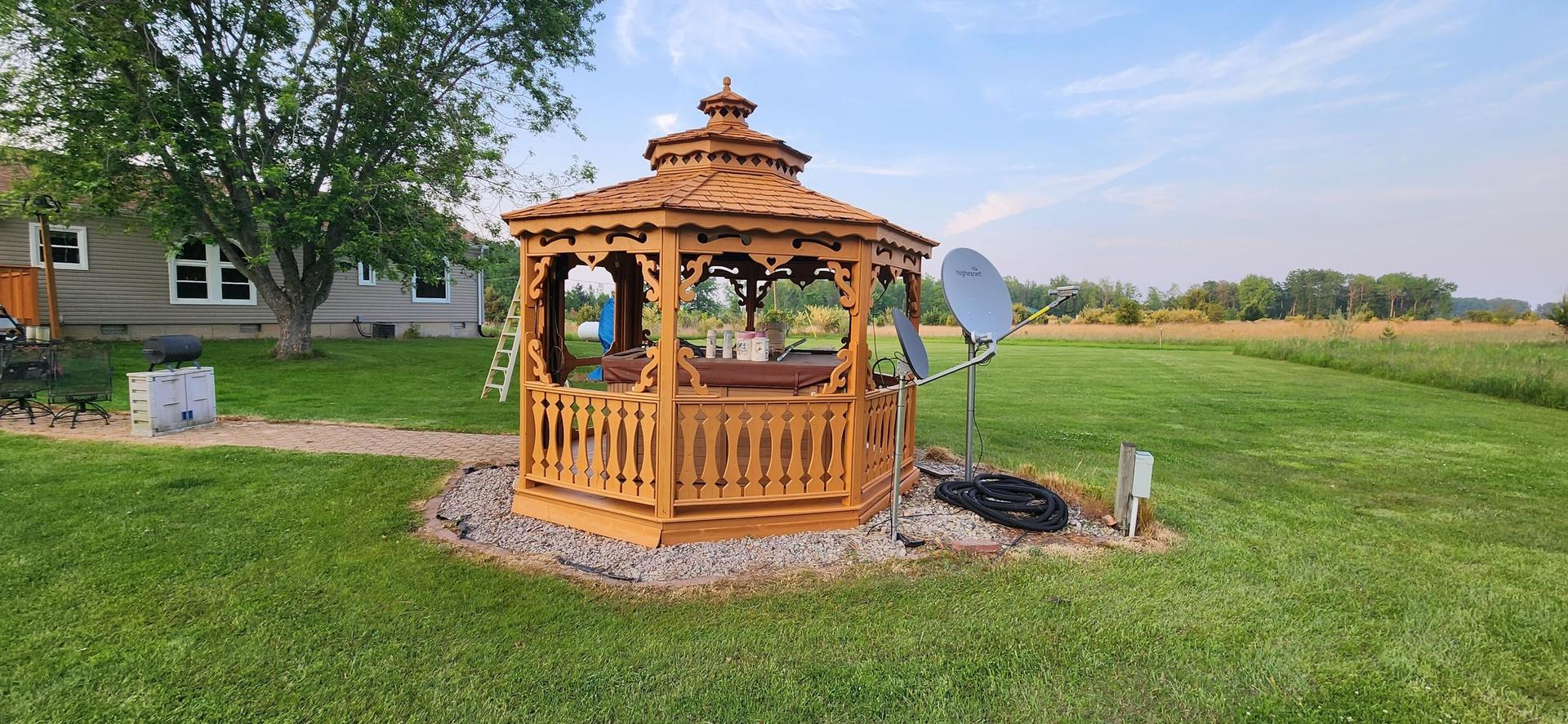 Freshly cleaned decks and gazebo after power washing in Prescott, MI