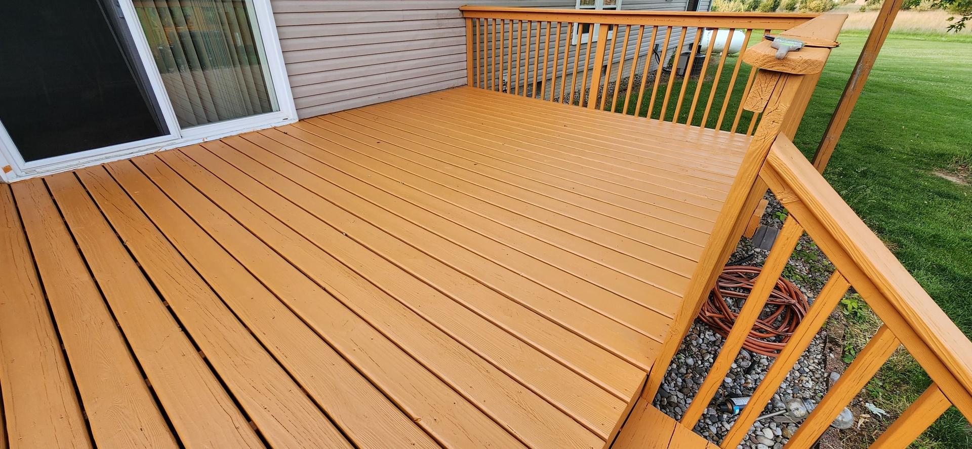 Freshly cleaned decks and gazebo after power washing in Prescott, MI