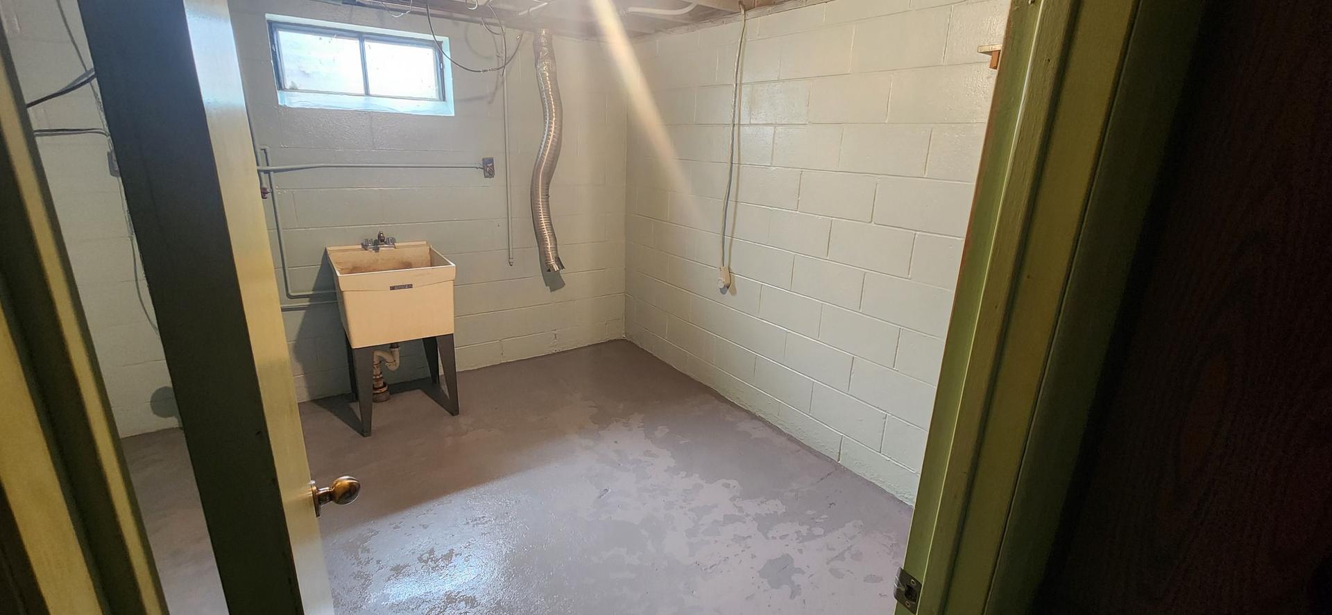 Freshly painted basement room in Essexville, MI