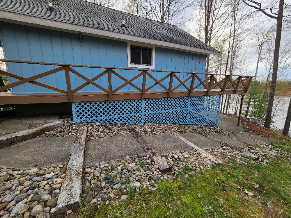 Freshly painted house and deck in Forest Lake, MI