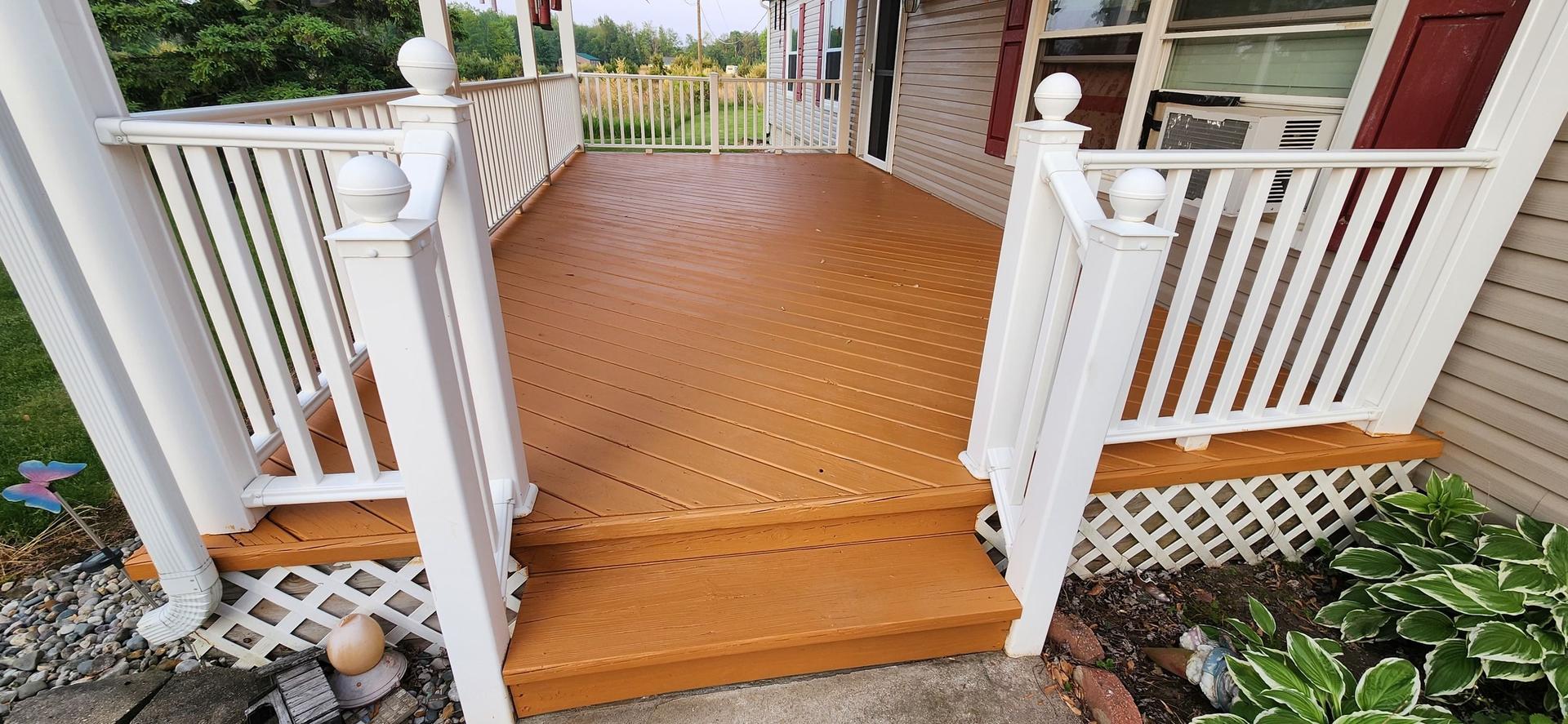 Freshly cleaned decks and gazebo after power washing in Prescott, MI