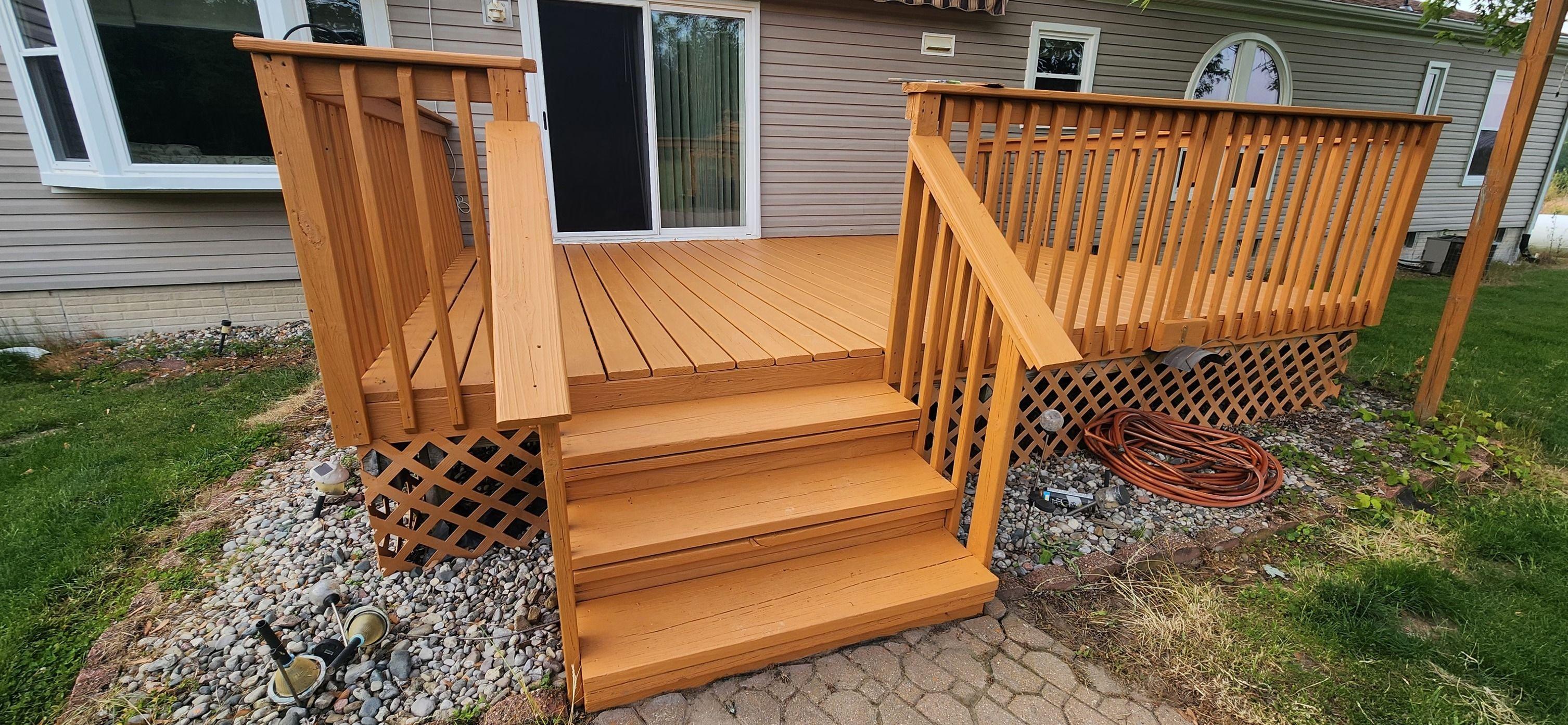 Freshly cleaned deck after power washing in Prescott, MI